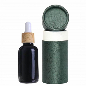 Pacote de caixa de tubo redondo embalado em papelão cosmético personalizado de alta qualidade para frasco de perfume de óleo essencial