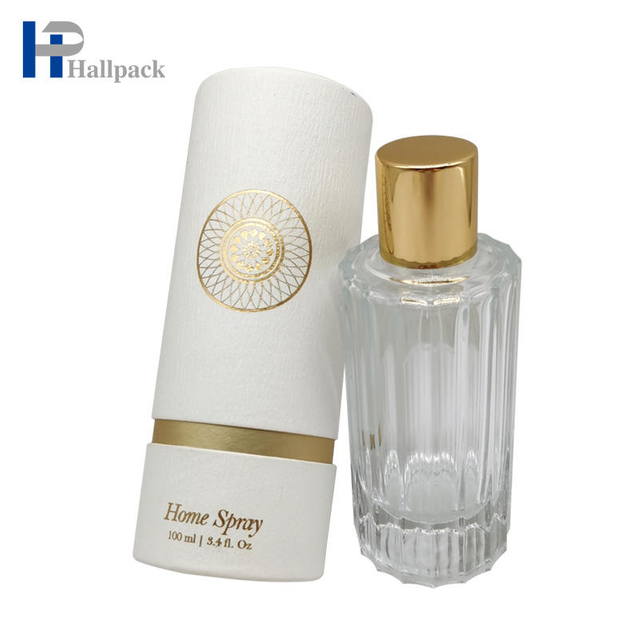 O papel redondo do tubo dos cuidados com a pele do óleo essencial combina o tubo de papel